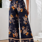 Pantalones Palazzo con estampado floral de cintura con nudo