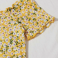 Vestido ribete en forma de lechuga de hombros descubiertos con estampado floral de margarita